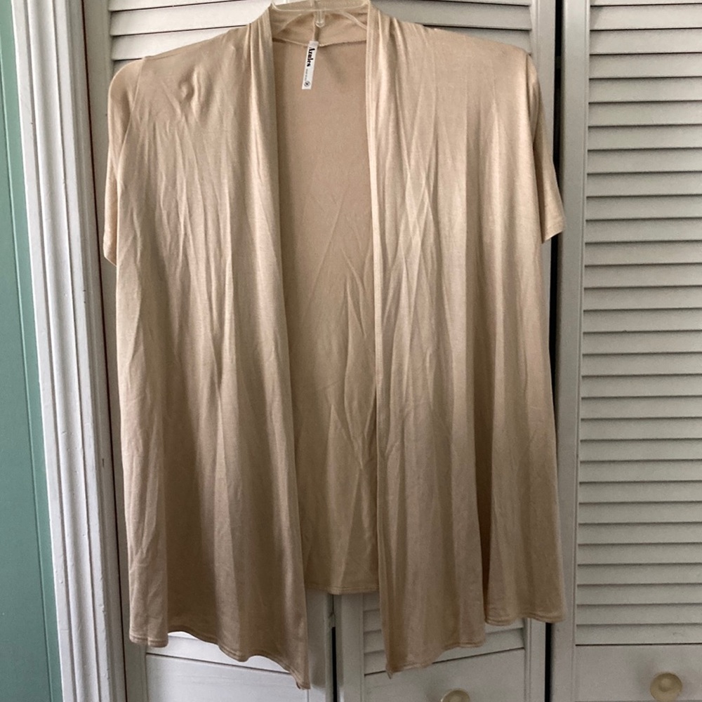 Short sleeve lightweight cardigan.